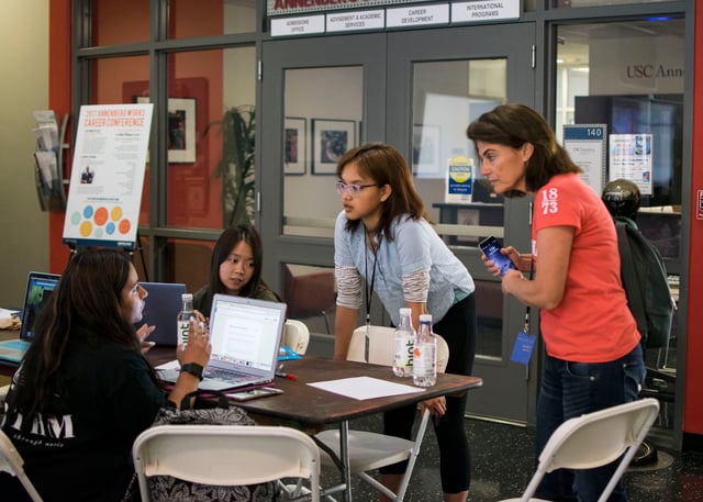 women working together at Break to Make hackathon