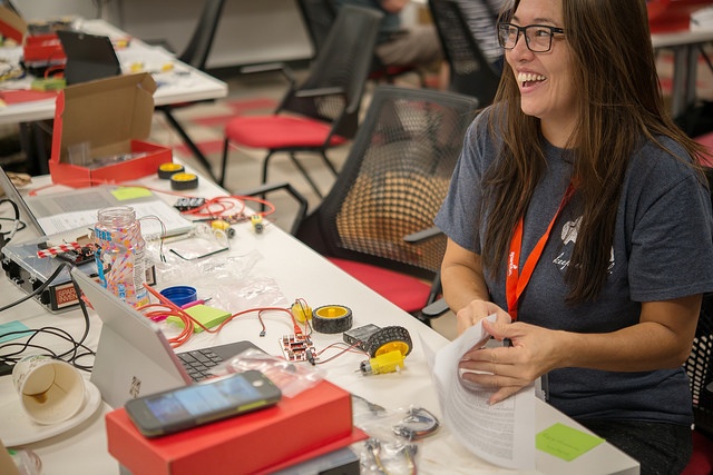 Educator having fun learning electronics