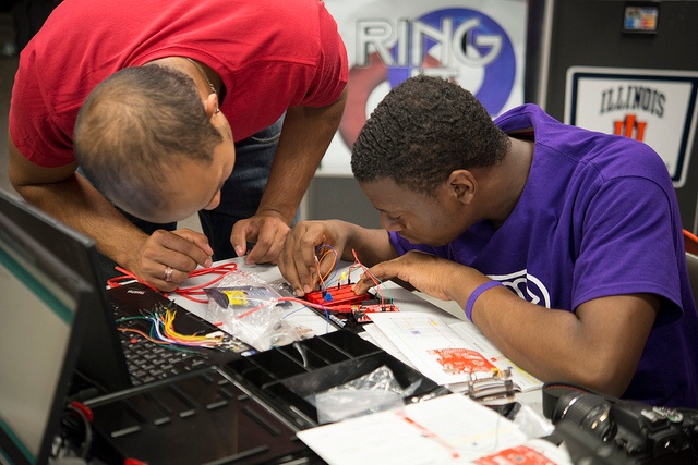 working on electronics together