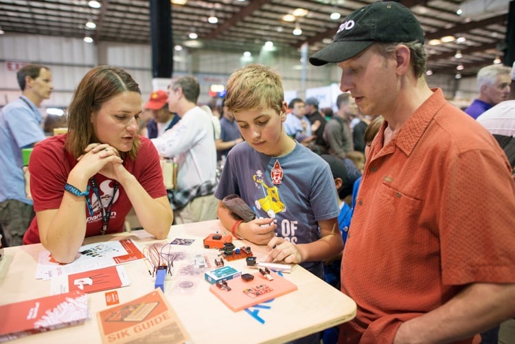 Child tinkering with a kit