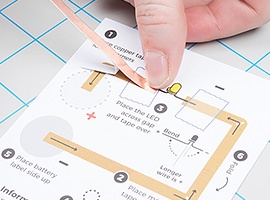 using copper tape to complete a paper circuit