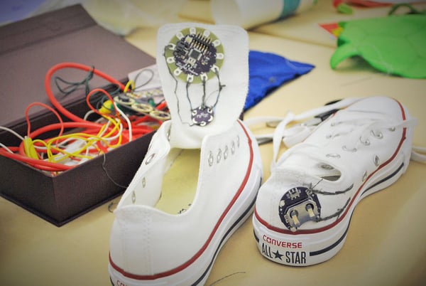 Sneakers that light up in the dark built with a LilyPad Simple Board and LilyPad Light Sensor